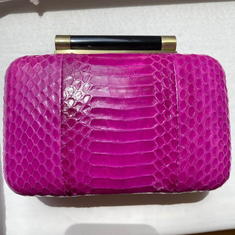 Diane von Furstenberg pink snake embossed clutch